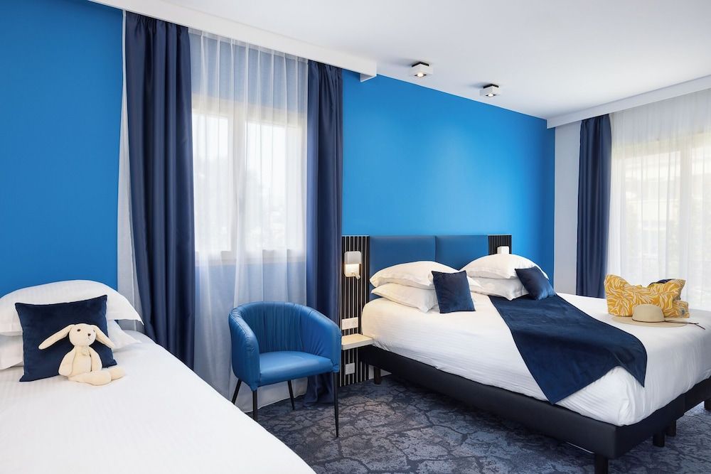Bild von Deluxe-Dreibettzimmer