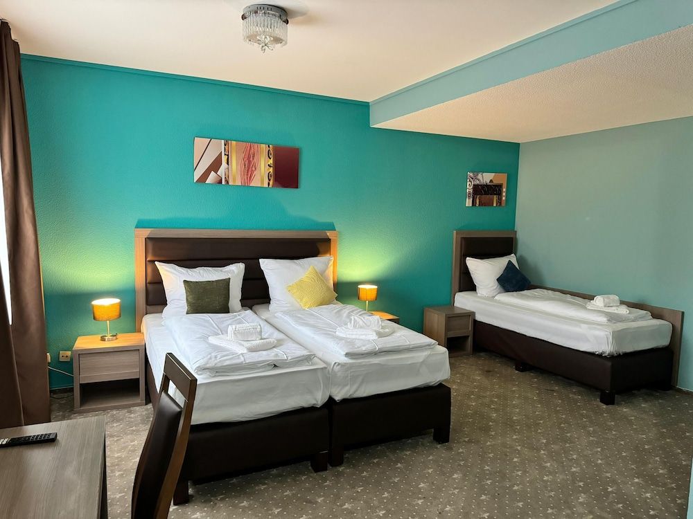 Bild von Standard-Dreibettzimmer