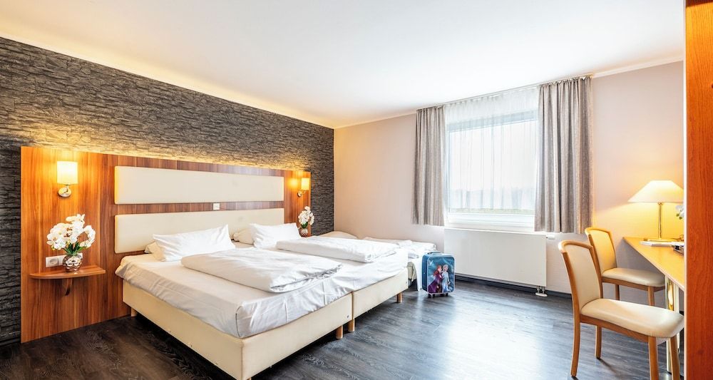 Bild von Comfort-Dreibettzimmer