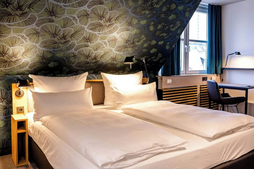Bild von Comfort-Zimmer, 1 Queen-Bett, zum Innenhof hin (Plus)