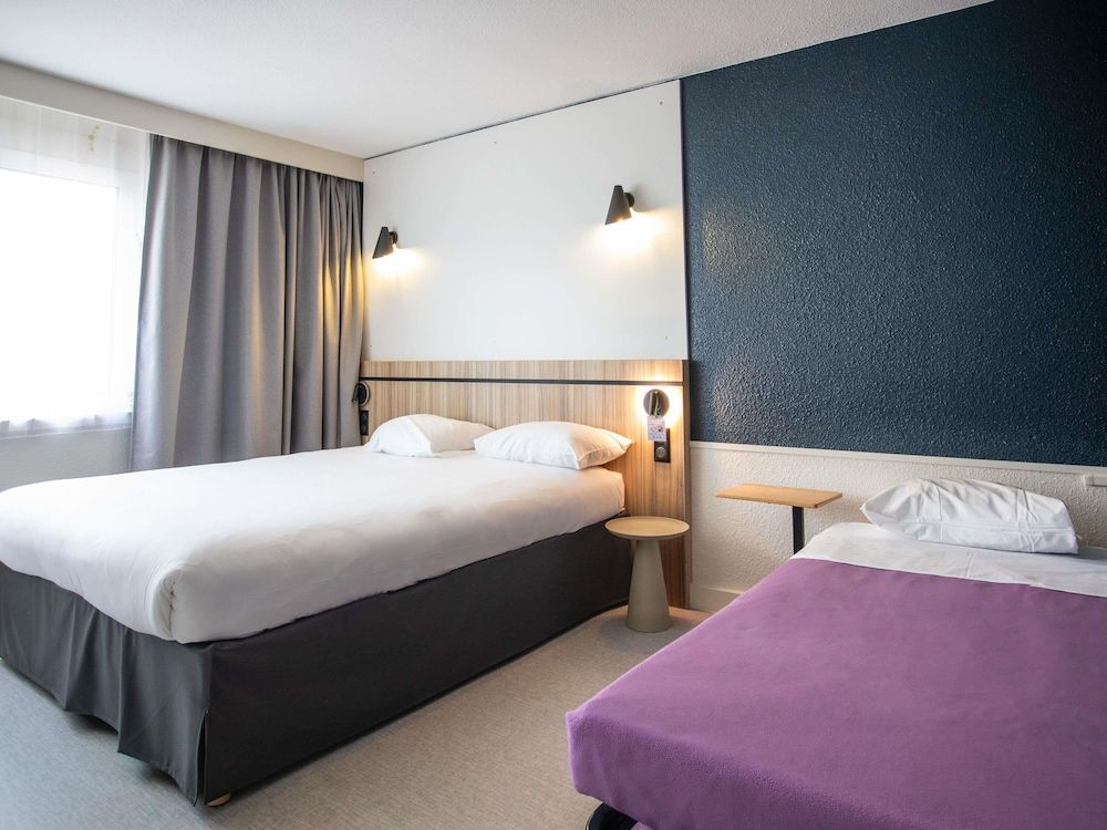Bild von Standard-Dreibettzimmer, 2 Doppelbetten