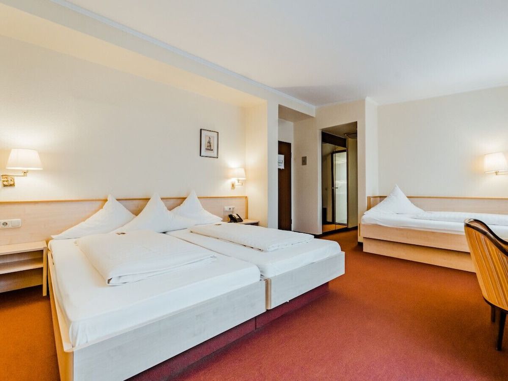 Bild von Dreibettzimmer
