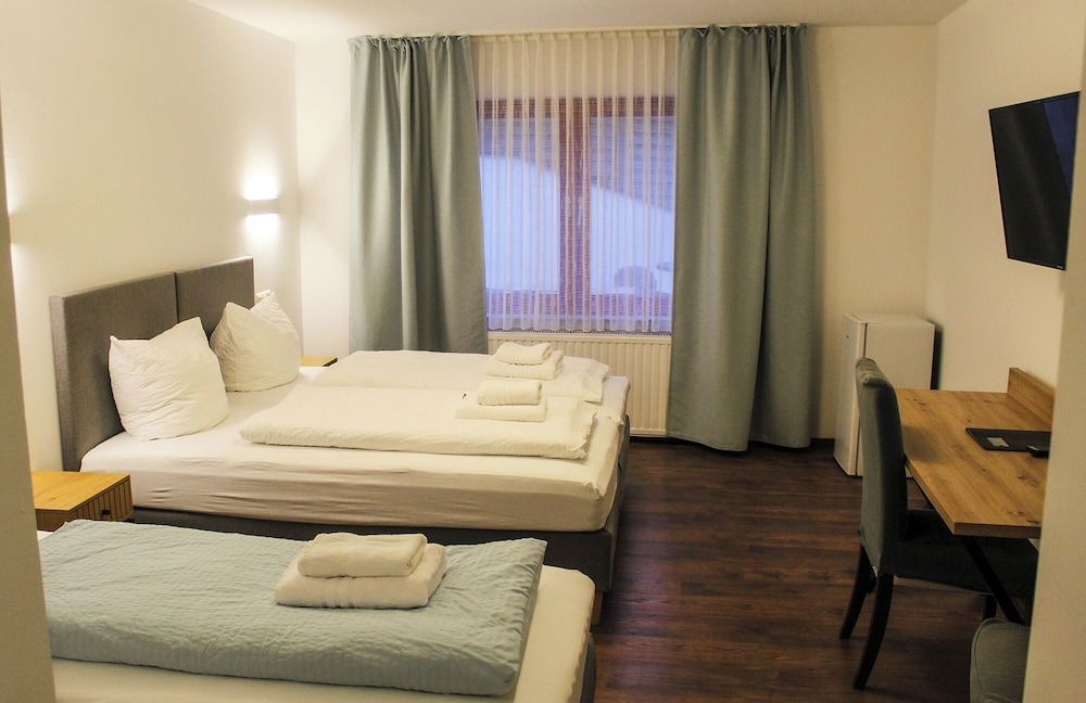 Bild von Dreibettzimmer