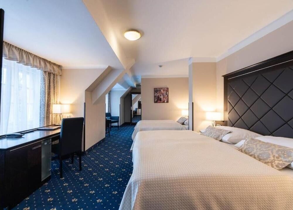 Bild von Deluxe-Vierbettzimmer