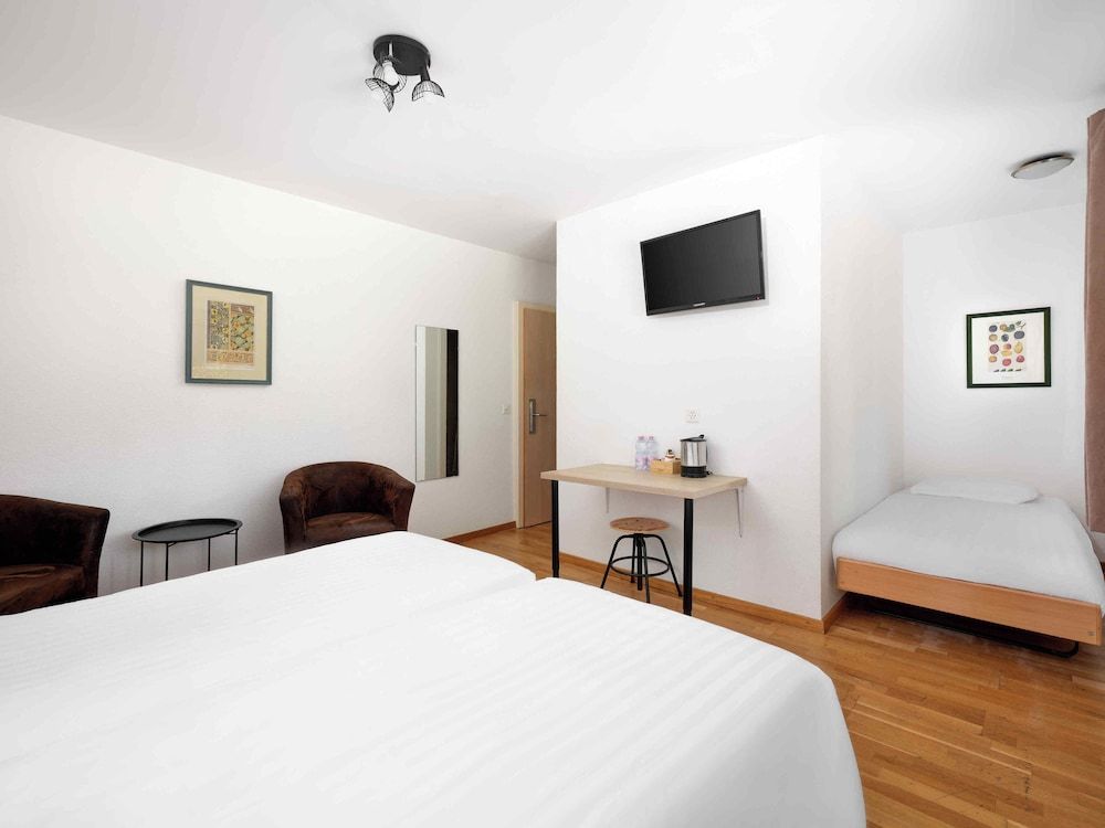 Bild von Dreibettzimmer