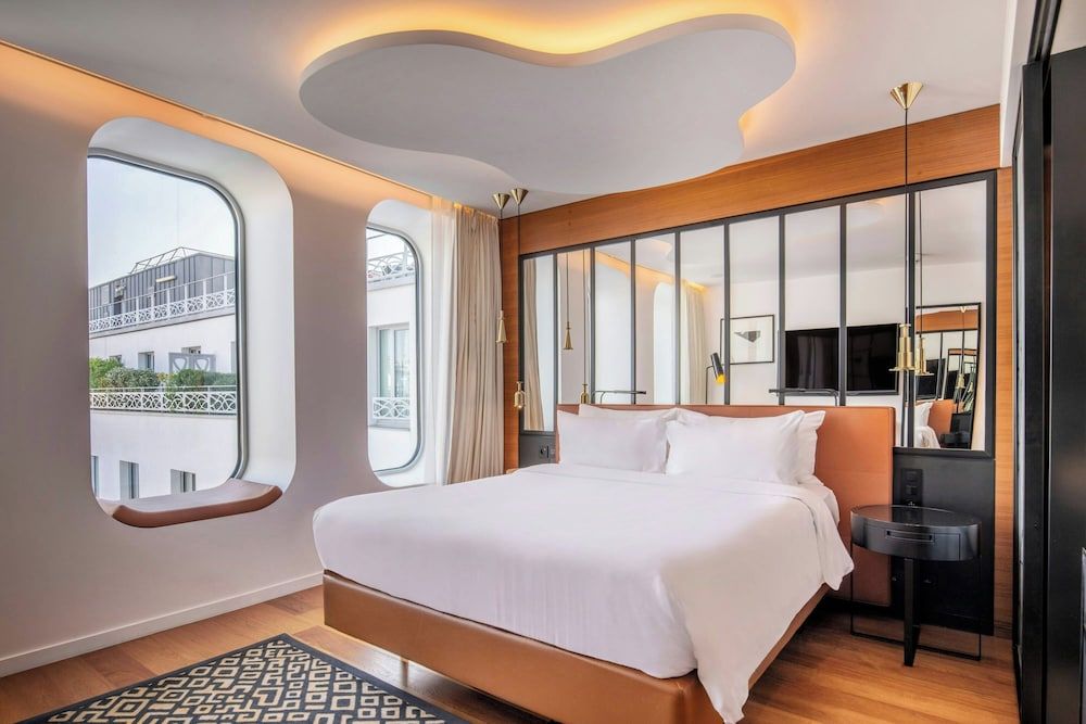 Bild von Zimmer, 1 Queen-Bett, Stadtblick