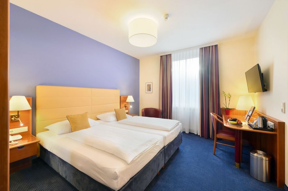 Bild von Comfort-Doppel- oder -Zweibettzimmer, Blick auf den Innenhof
