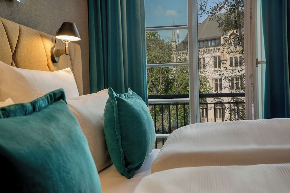 Bild von Zimmer (SPECIAL ONE with a balcony and a view)