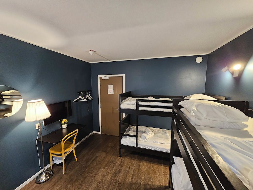 Bild von Economy-Vierbettzimmer (Private External Bathroom)