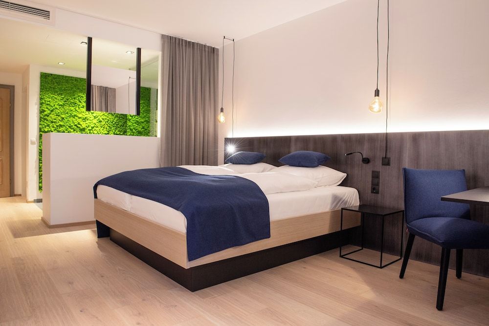 Bild von Premium-Dreibettzimmer, Bergblick, zum Garten hin
