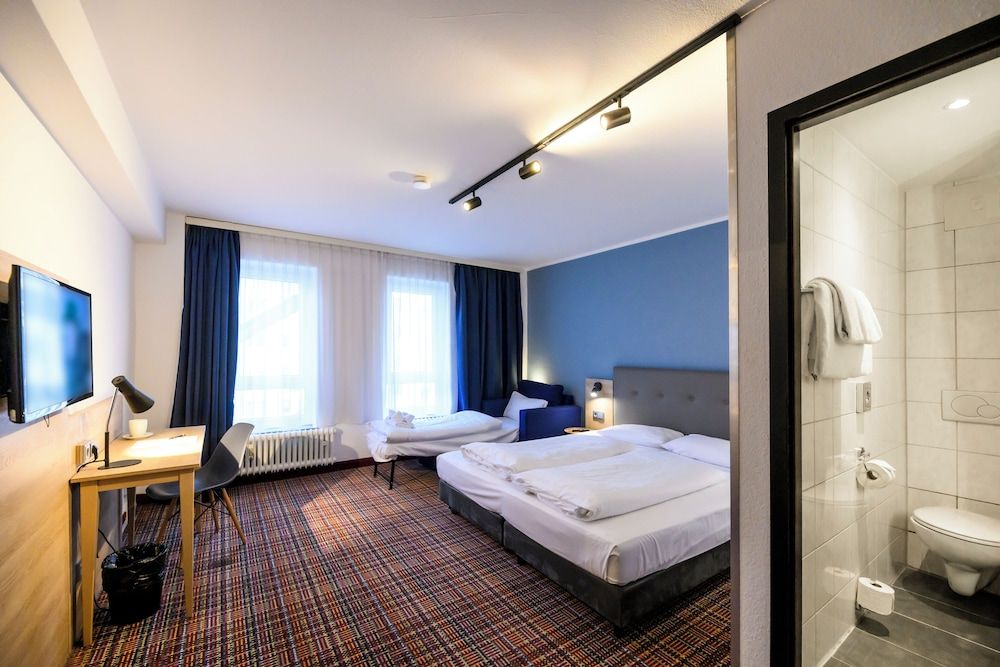 Bild von Standard-Dreibettzimmer