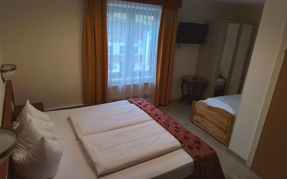 Bild von Dreibettzimmer