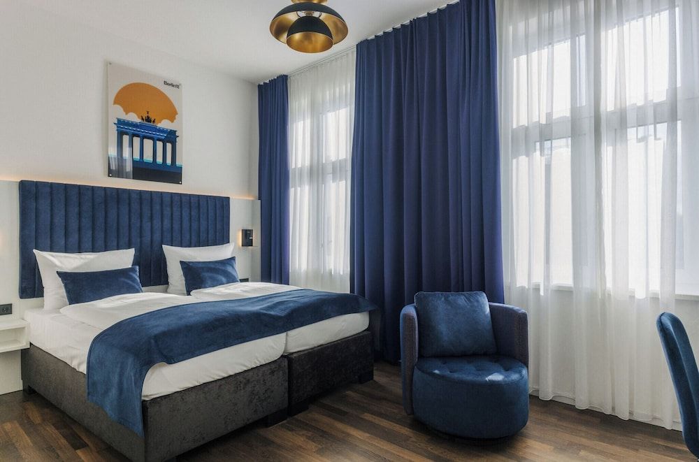 Bild von Deluxe-Dreibettzimmer